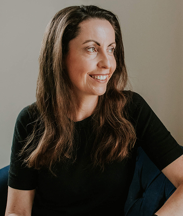 picture of woman smiling looking away